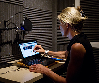 Amy Bourne works on one of her courses in the Ecampus recording studio