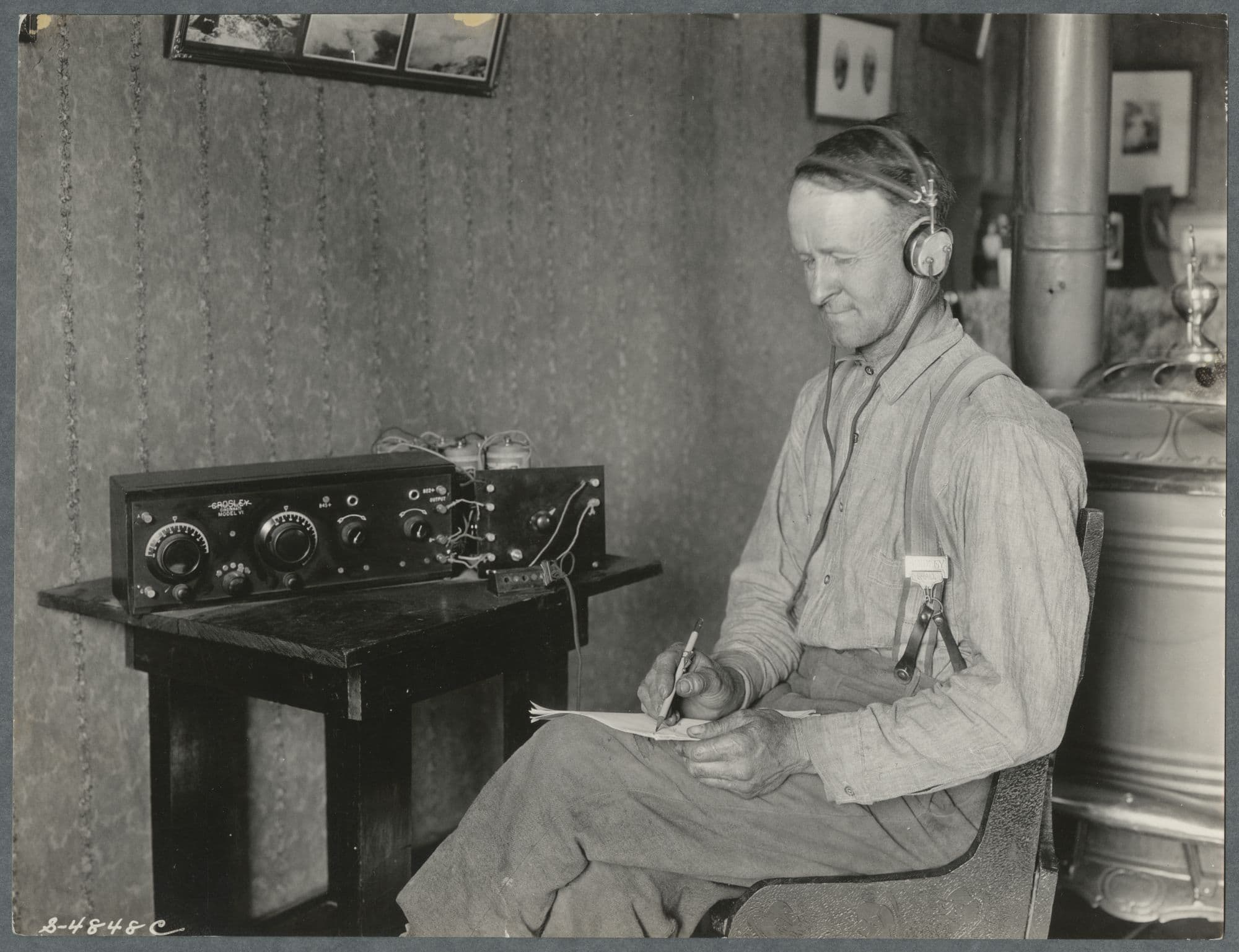 Farmer listening to KOAC