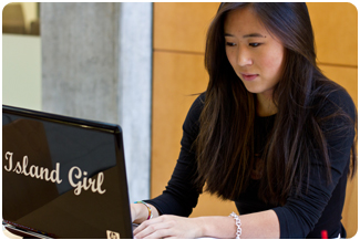 OSU student using a laptop