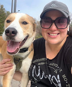Jessica Valiz smiles with her dog Lorelai