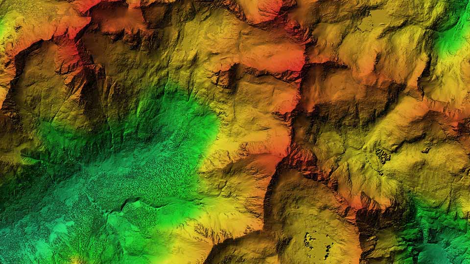 Digital terrain map with multicolor elevation shading representing GIS analysis of landscape features.