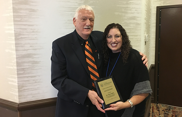 OSU College of Education counseling program coordinator Gene Eakin is presented the 2017 Leona Tyler award.