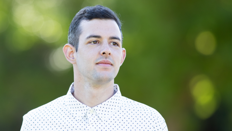 Toby Long looks off in the distance. As a way to move up at work, Toby earned his business administration bachelor's degree online through Oregon State University Ecampus in 2019.